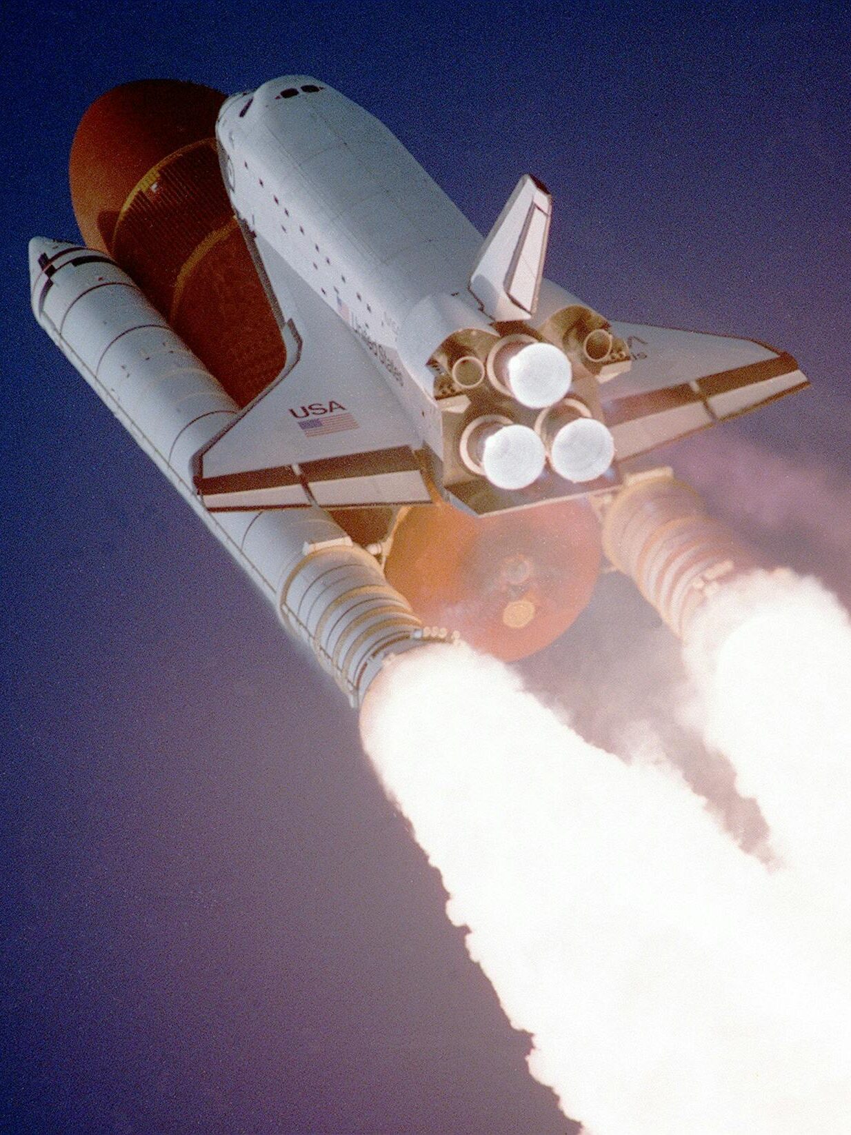A space shuttle launches into space, showcasing powerful rocket engines and USA branding.